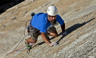 Male rock climber. clipart