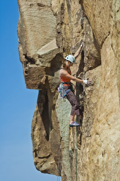 Female rock climber. Stock Photo
