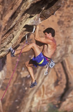 Male rock climber. clipart