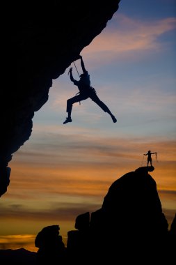 Male rock climber. clipart