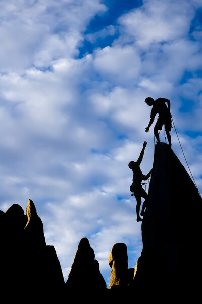 Team of climbers on the summit.