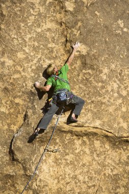 Male rock climber. clipart