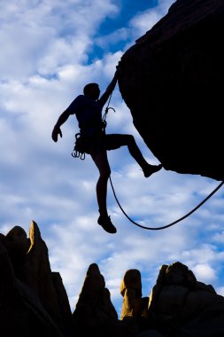 Male rock climber. clipart