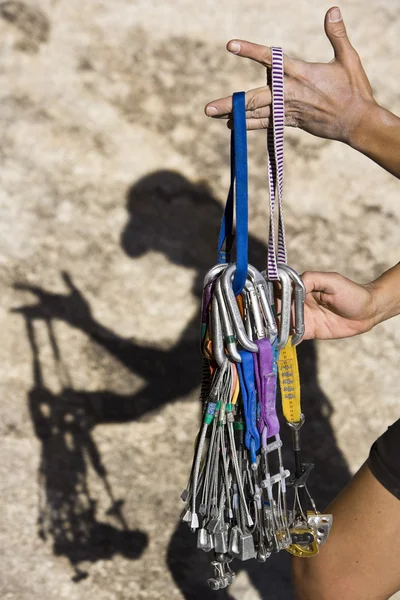 Climber organizing gear. — Stock Photo, Image