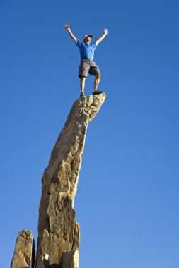 Man on the summit. clipart