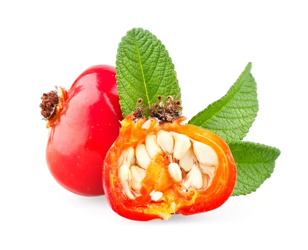 Whole and half rose hip with leaves — Stock Photo, Image