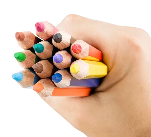 Barevné tužky v ruce — Stock fotografie