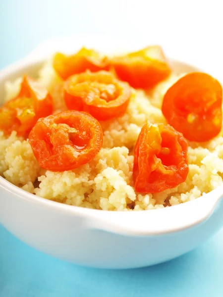 Couscous with tomatoes — Stock Photo, Image