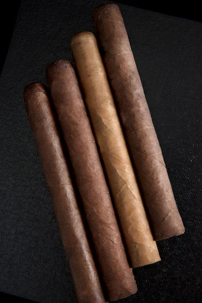 Cigars on a dark background — Stock Photo, Image