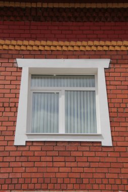 Wall brick building with a window clipart