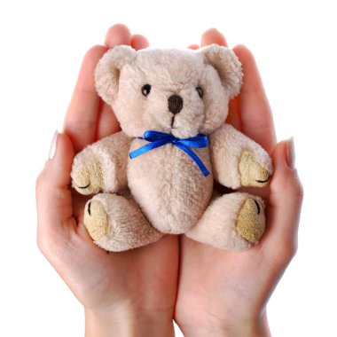 Caring hands holding a toy clipart