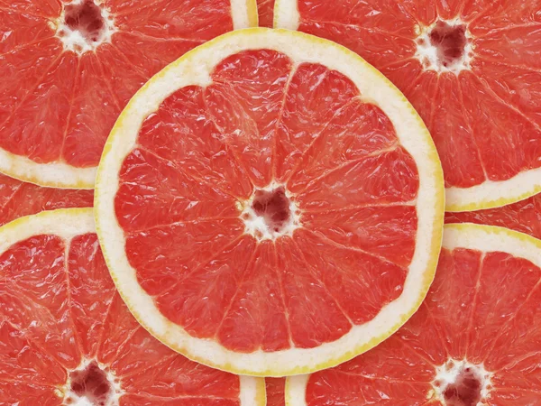 Грейпфрут красный, нарезанный — ストック写真