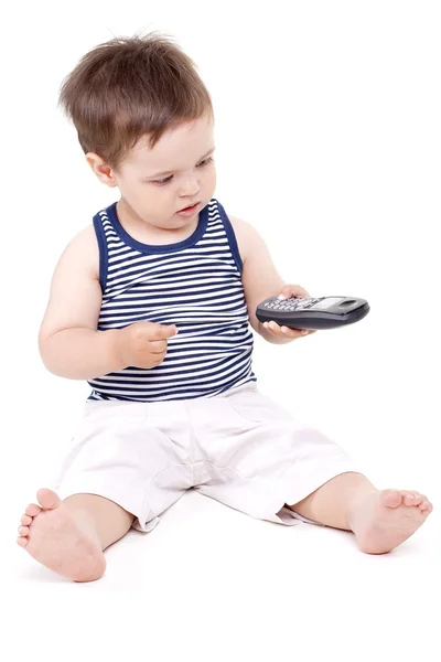 Criança pequena com um telefone — Fotografia de Stock
