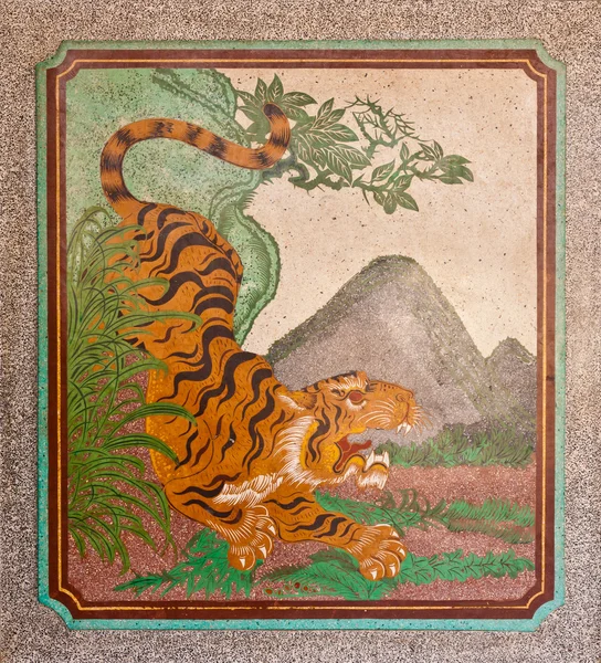 Tigermalerei an mable Wand — Stockfoto