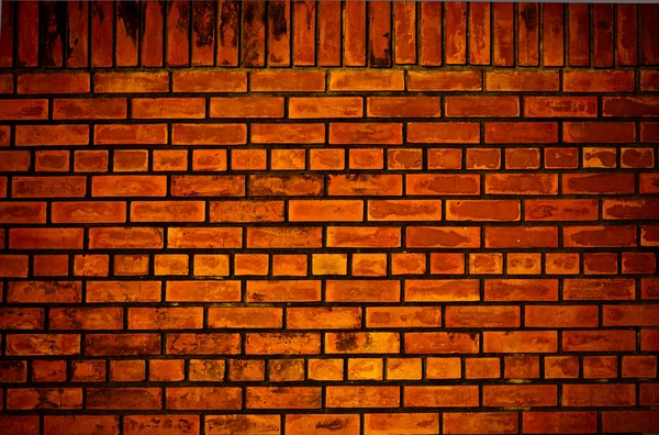 Alte orangefarbene Ziegelmauer — Stockfoto