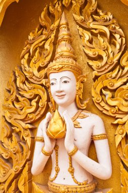 Angel decoration of buddhist temple tilted out clipart