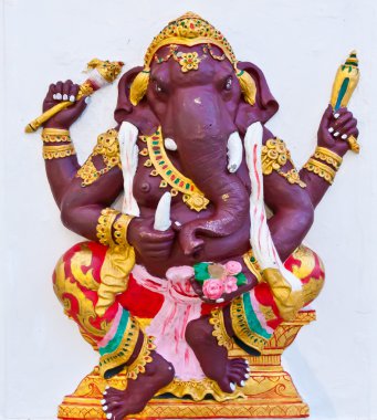 Purple ganesha with weapons on white wall clipart