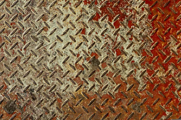 Roestige rode en witte metalen plaat textuur — Stockfoto