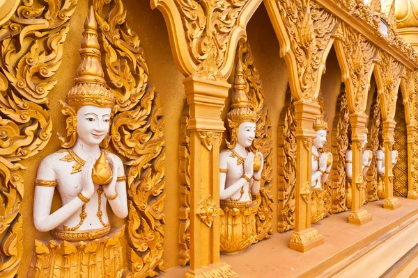 Angel wall of buddhist temple overall tilted out — Stock Photo, Image