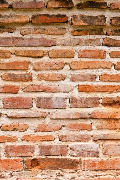 Parede de tijolo muito sujo vertical — Fotografia de Stock