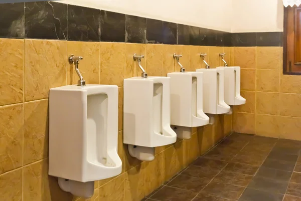 Urinals in row — Stock Photo, Image
