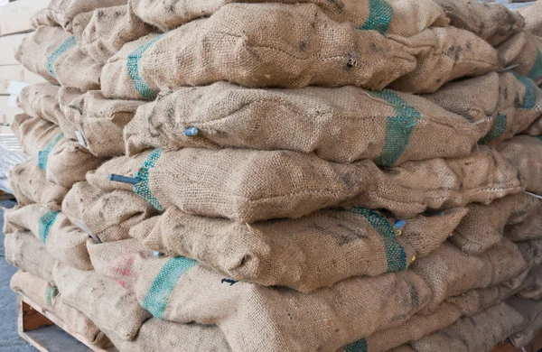 Pile of sacks tilted — Stock Photo, Image