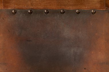 Old weathered leather tacked