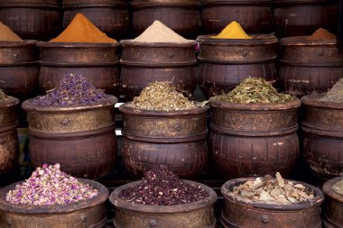 Dried herbs flowers spices in the Marrakesh street shop clipart