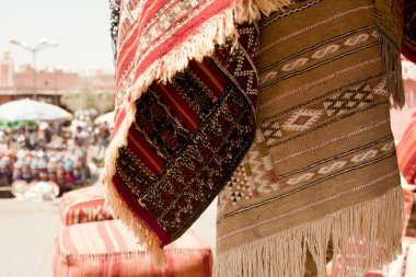 Moroccan Carpets in a street shop souk clipart