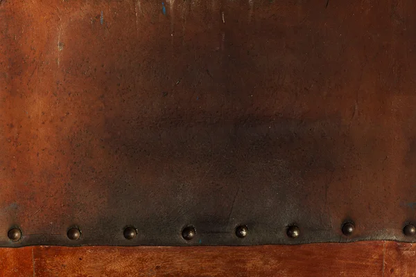 Old weathered leather tacked — Stock Photo, Image