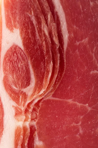Dry cured ham background — Stockfoto