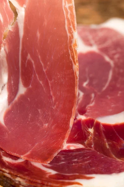 Slice of dry cured ham — Stock Photo, Image