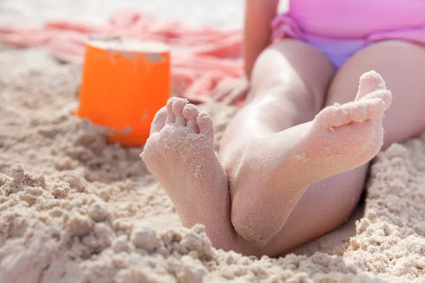 stock image Kid on golden beach sand, shallow dof