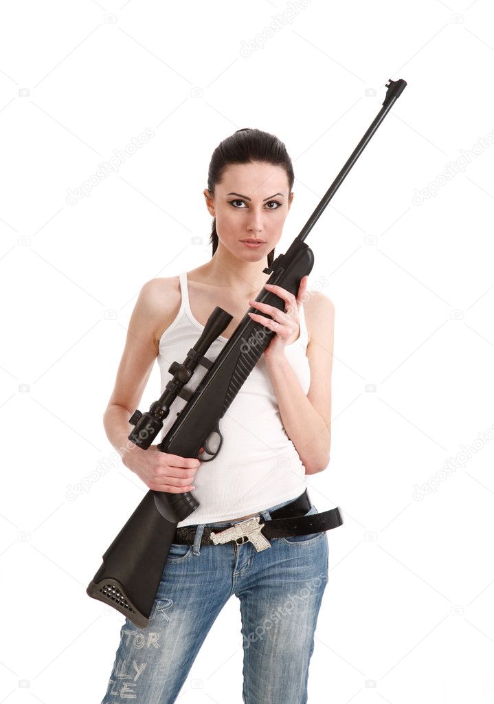 Beautiful young woman holding a sniper rifle