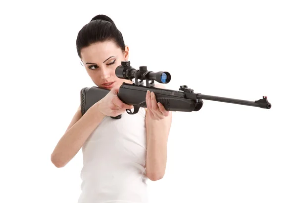Jovem mulher sexy com um rifle sniper . — Fotografia de Stock