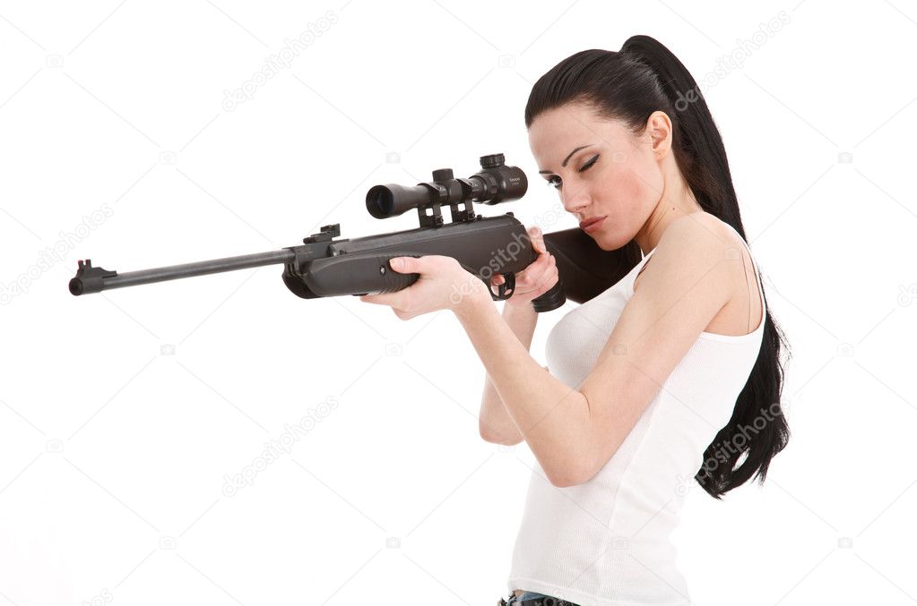 Young sexy woman with a sniper rifle.