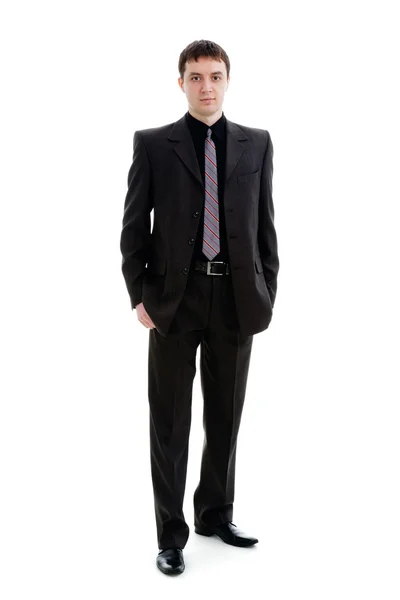 Ένας νεαρός άνδρας σε ένα κοστούμι, σε μεγάλου μήκους. — Φωτογραφία Αρχείου