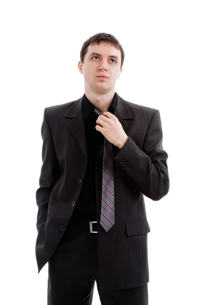 A young man in a suit, tie untied. — Stock Photo, Image