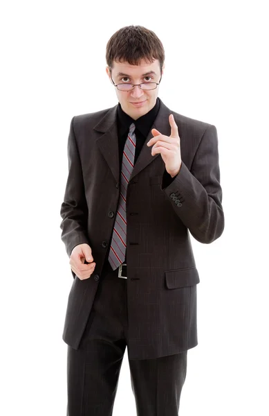 A young man in a suit, glasses and tie, threatening finger. — Stock Photo, Image