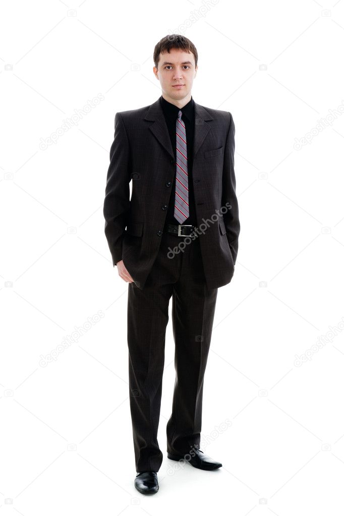 A young man in a suit, in full-length.
