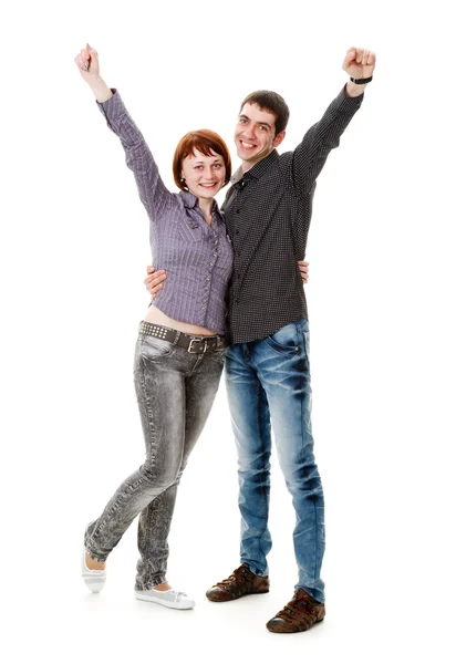 Junge Frau und Mann stehen auf dem Boden und freuen sich. — Stockfoto