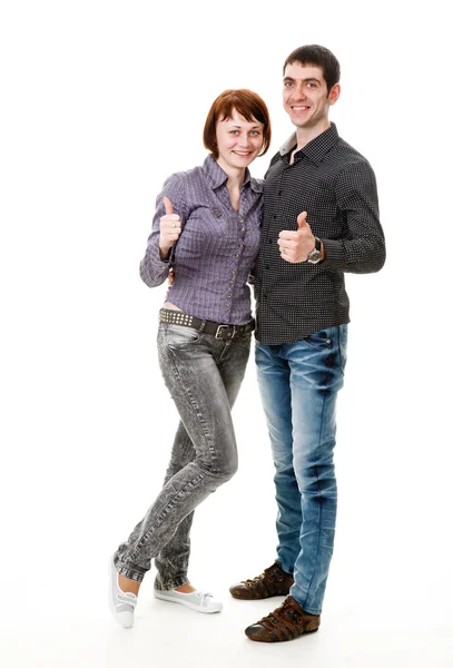 Young woman and man standing on the floor, and rejoice. — Stock Photo, Image