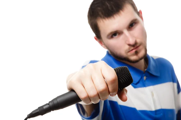 A young boy holding a microphone, close up. — Stock Photo, Image