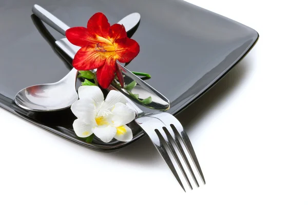 Zestaw naczynia ozdobione kwiatami — Zdjęcie stockowe