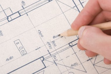 Architect with blueprint clipart