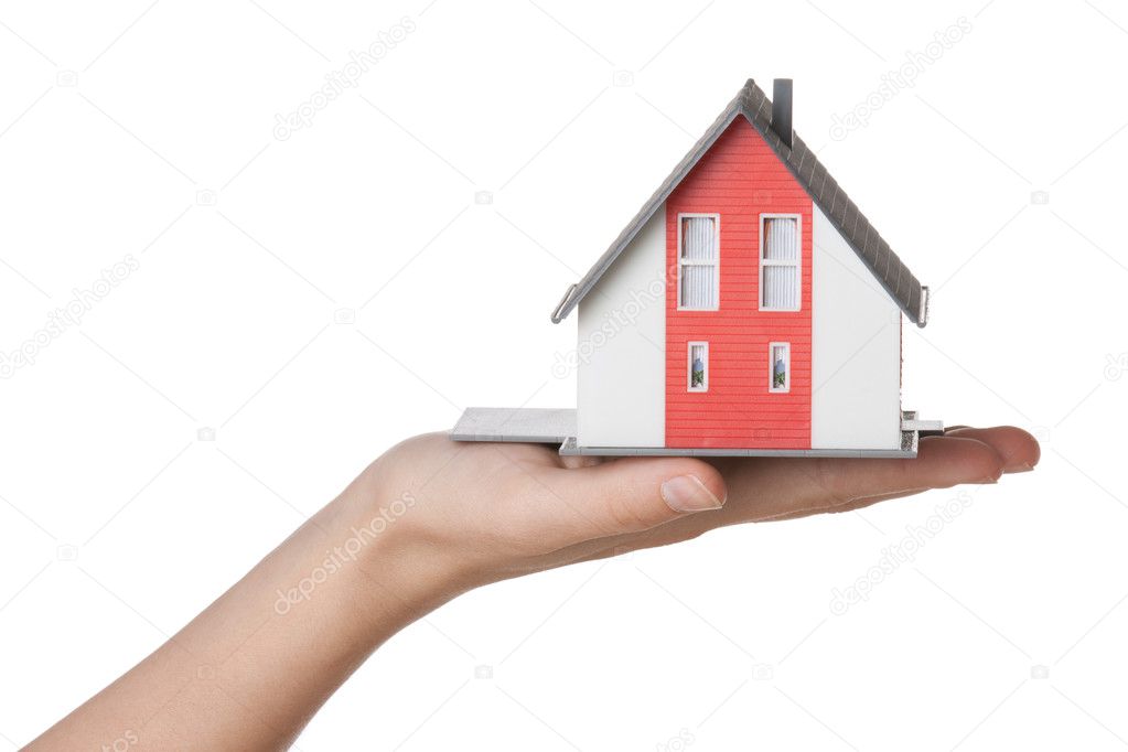Hand with house