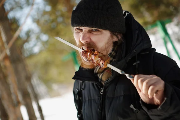 stock image Man with a barbeque