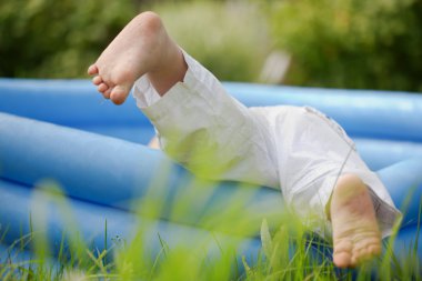 Boy and a swimming pool clipart