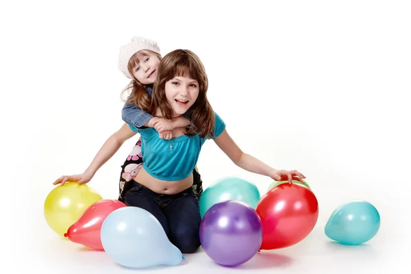 Meisjes met ballonnen. — Stockfoto