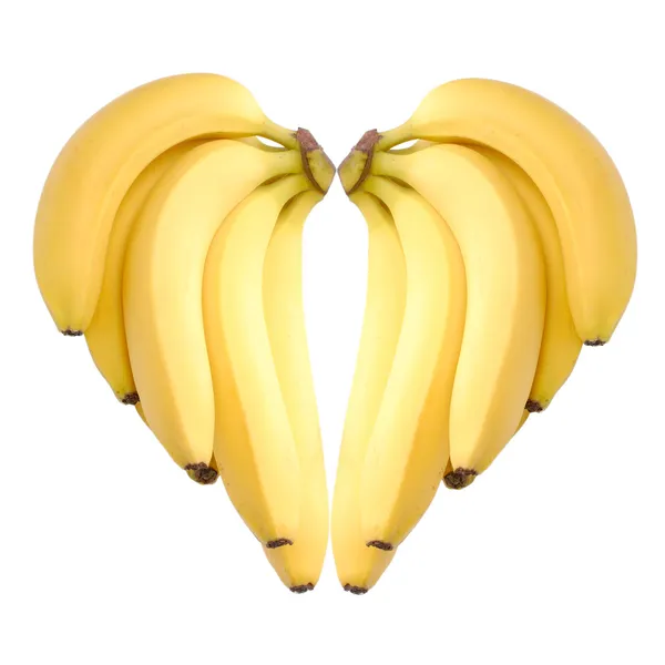 Reife Bananen Herz isoliert auf weiß — Stockfoto